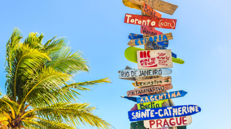 a sign post with many different directions