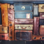 a group of suitcases stacked in a pile