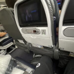 a tv in the seat of an airplane