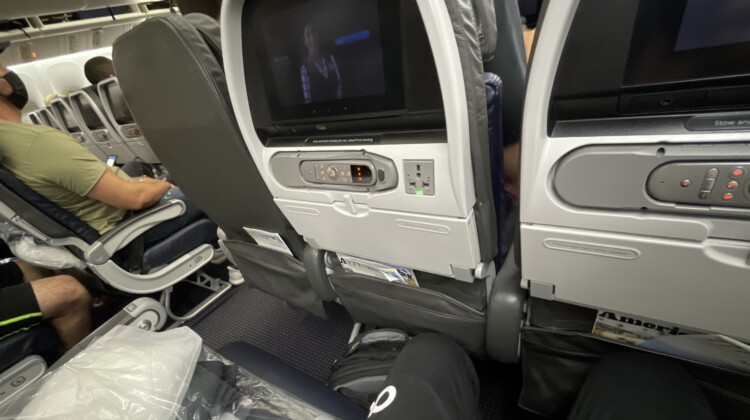 a tv in the seat of an airplane