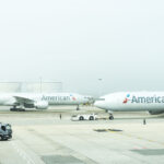 two airplanes on the runway