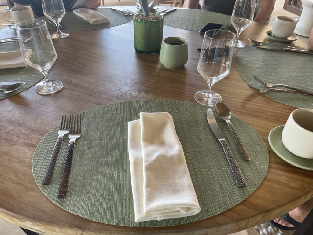 a table with a napkin and silverware