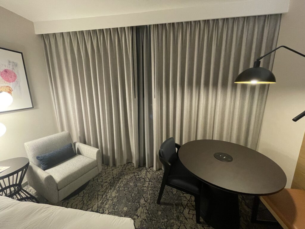 a room with a table and chairs