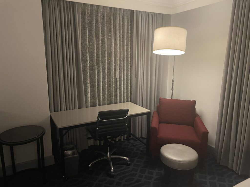 a desk and chair in a room
