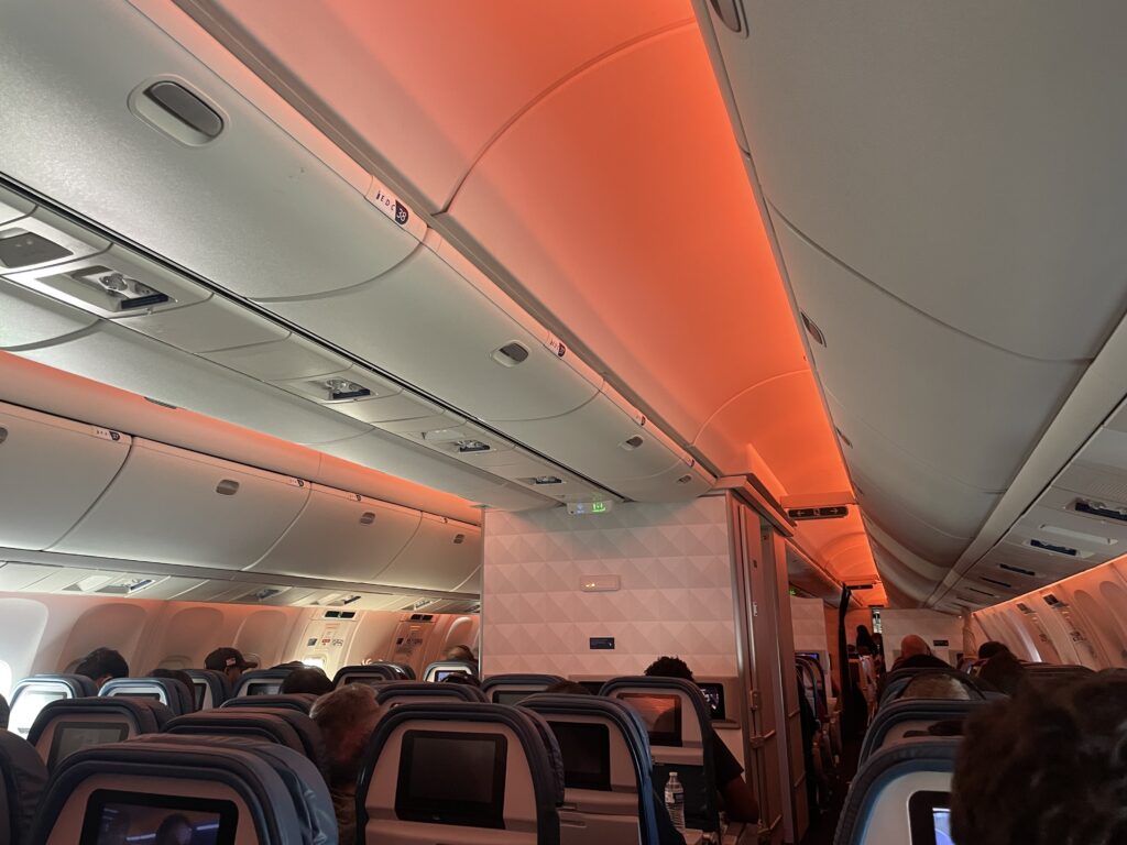 an airplane with seats and seats on the ceiling
