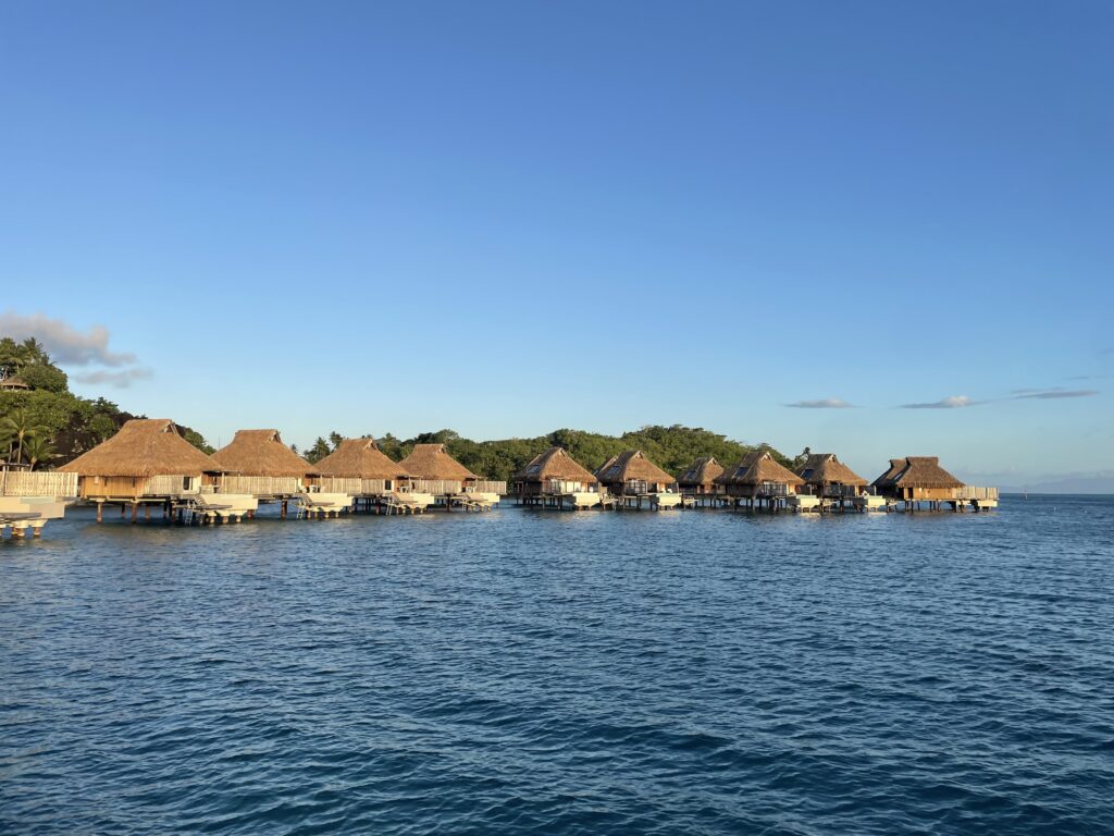 a group of houses on water