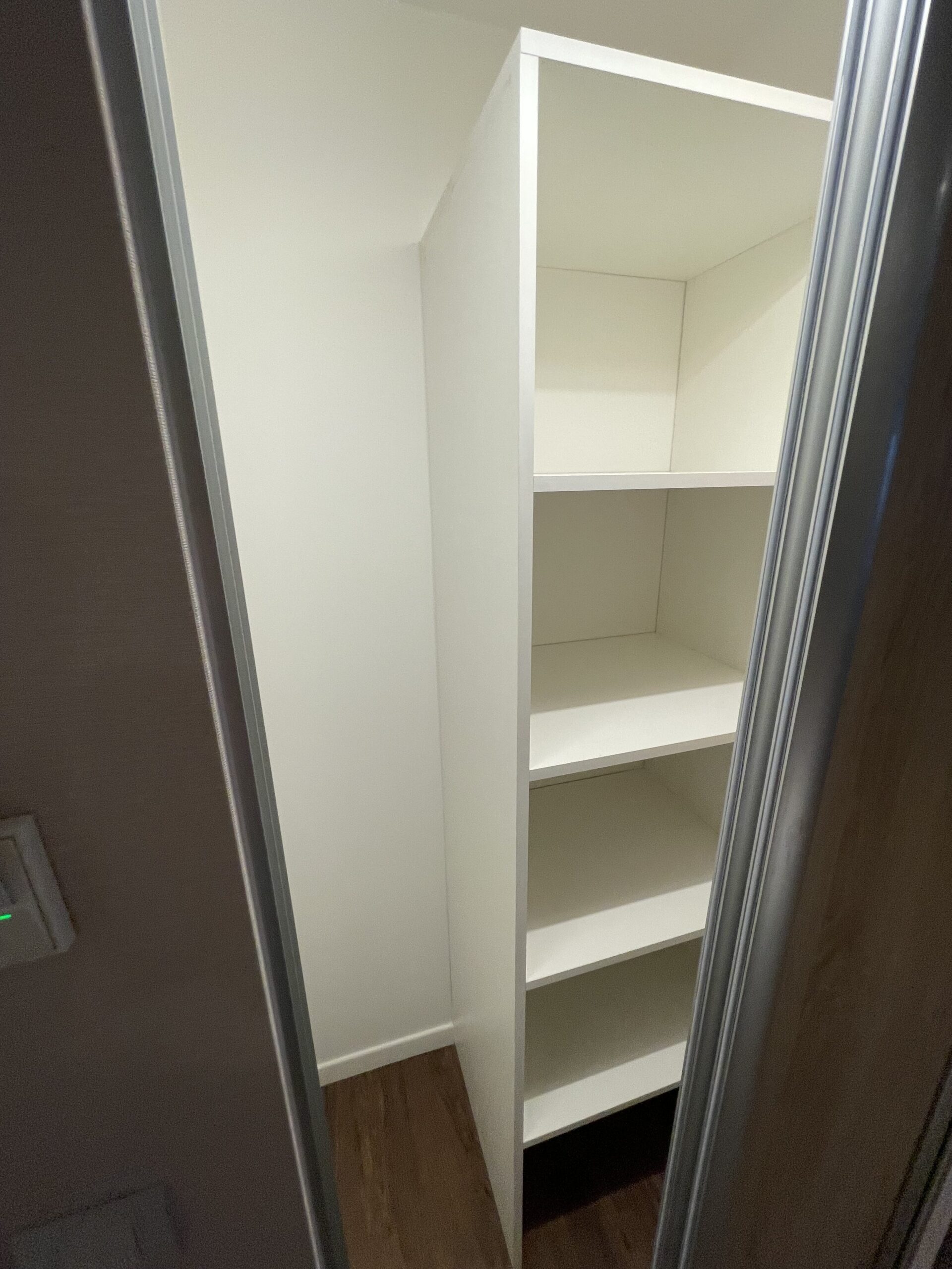 a closet with shelves inside