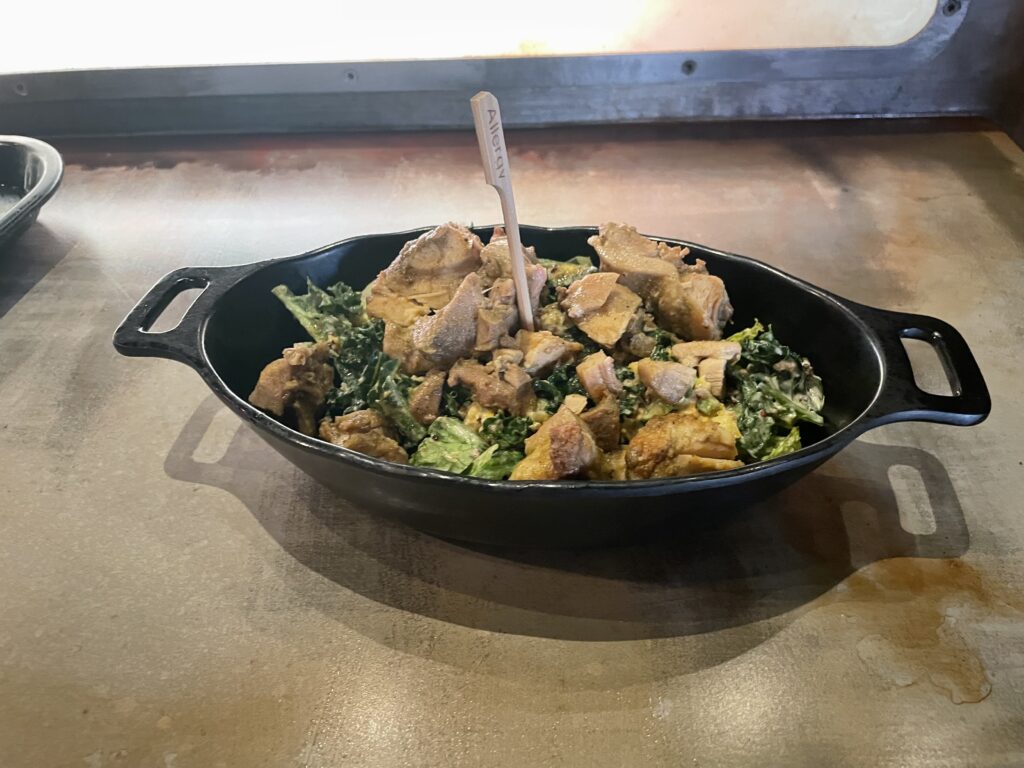 a black pan with food in it