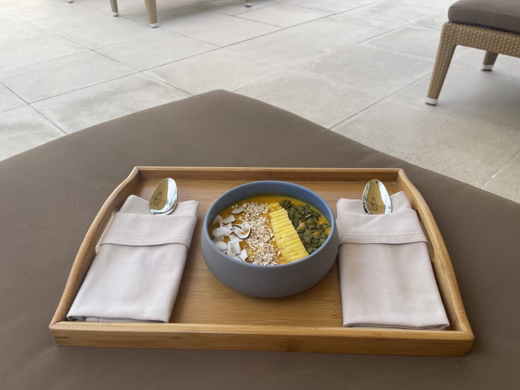 a bowl of food on a tray