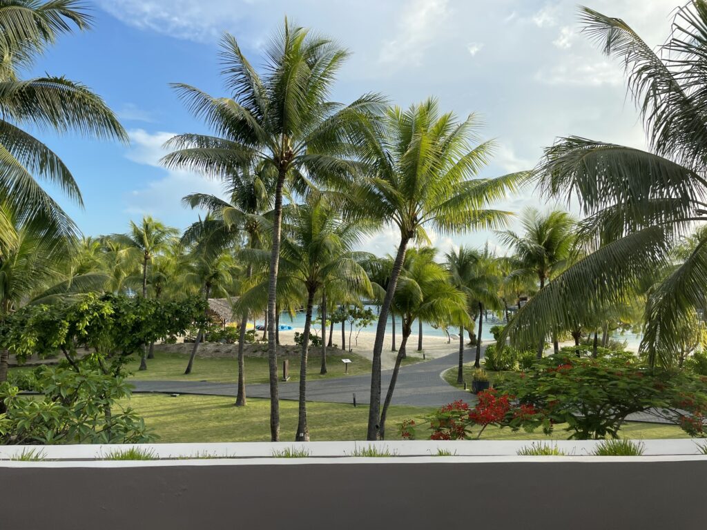 a view of a beach from a balcony