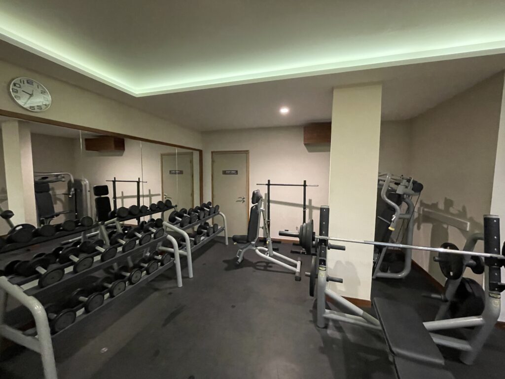 a room with weights and a door