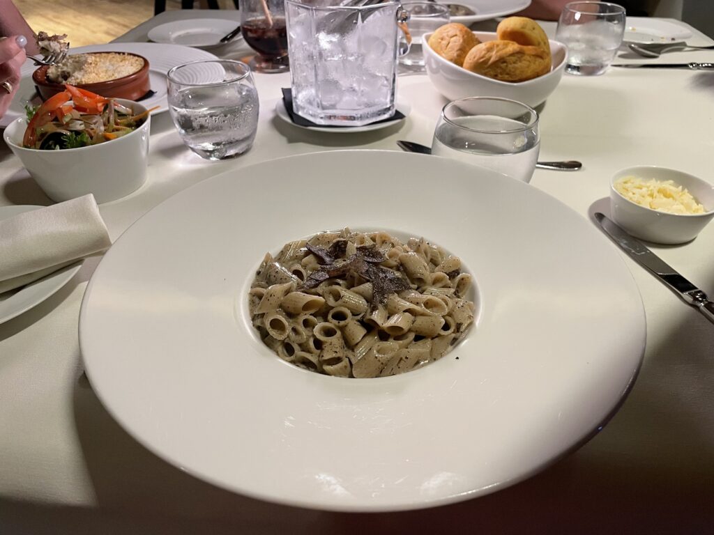 a plate of pasta on a table