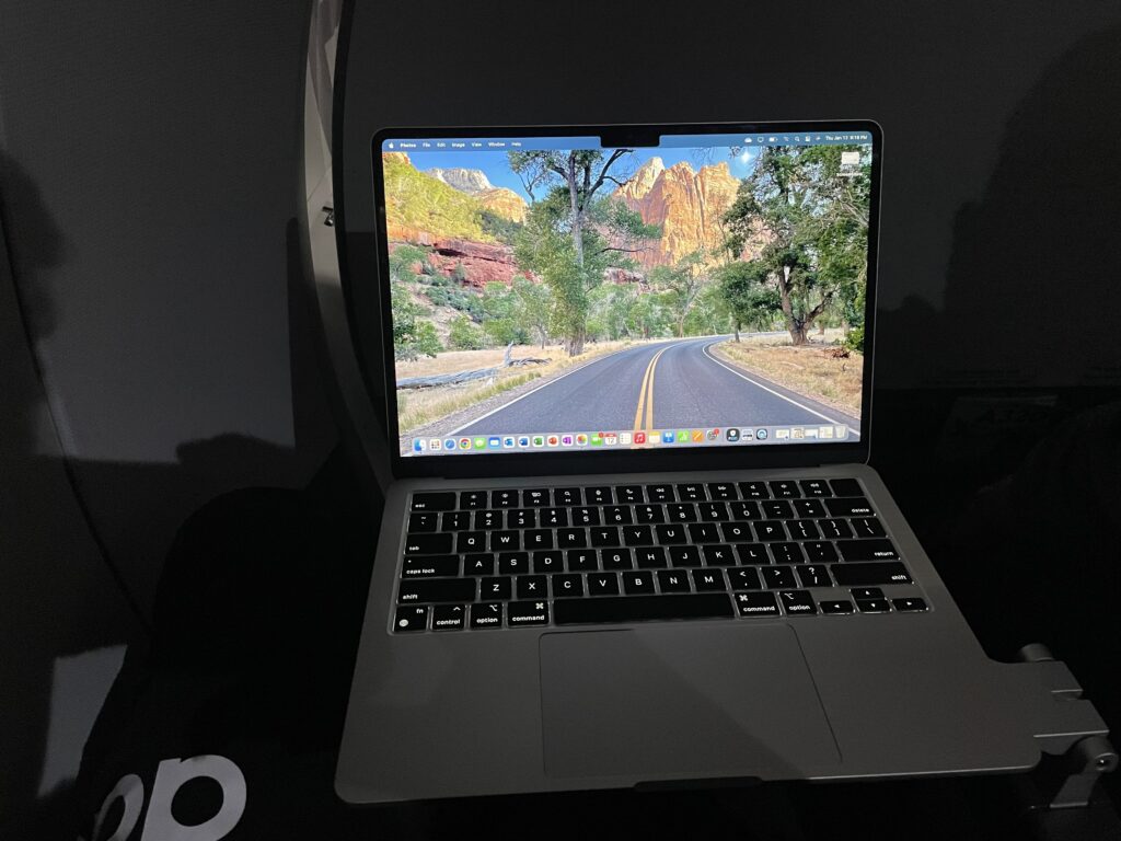 a laptop with a road on the screen
