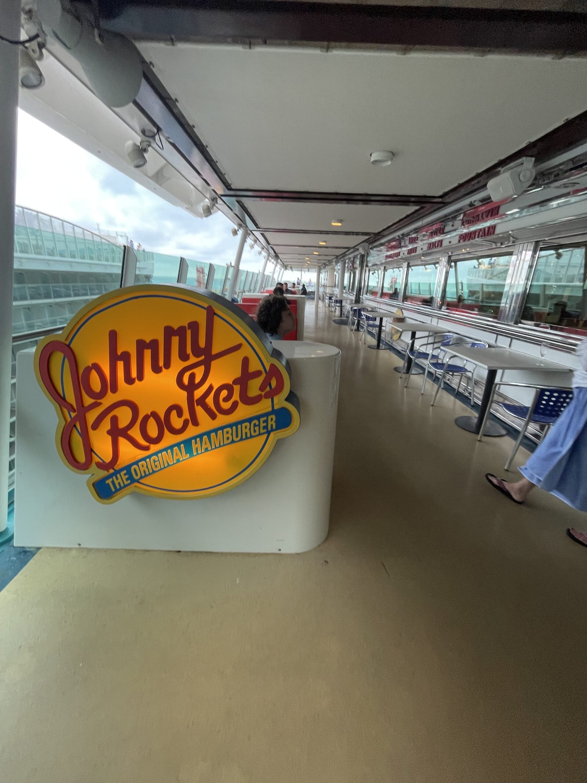 a restaurant sign on a cruise ship