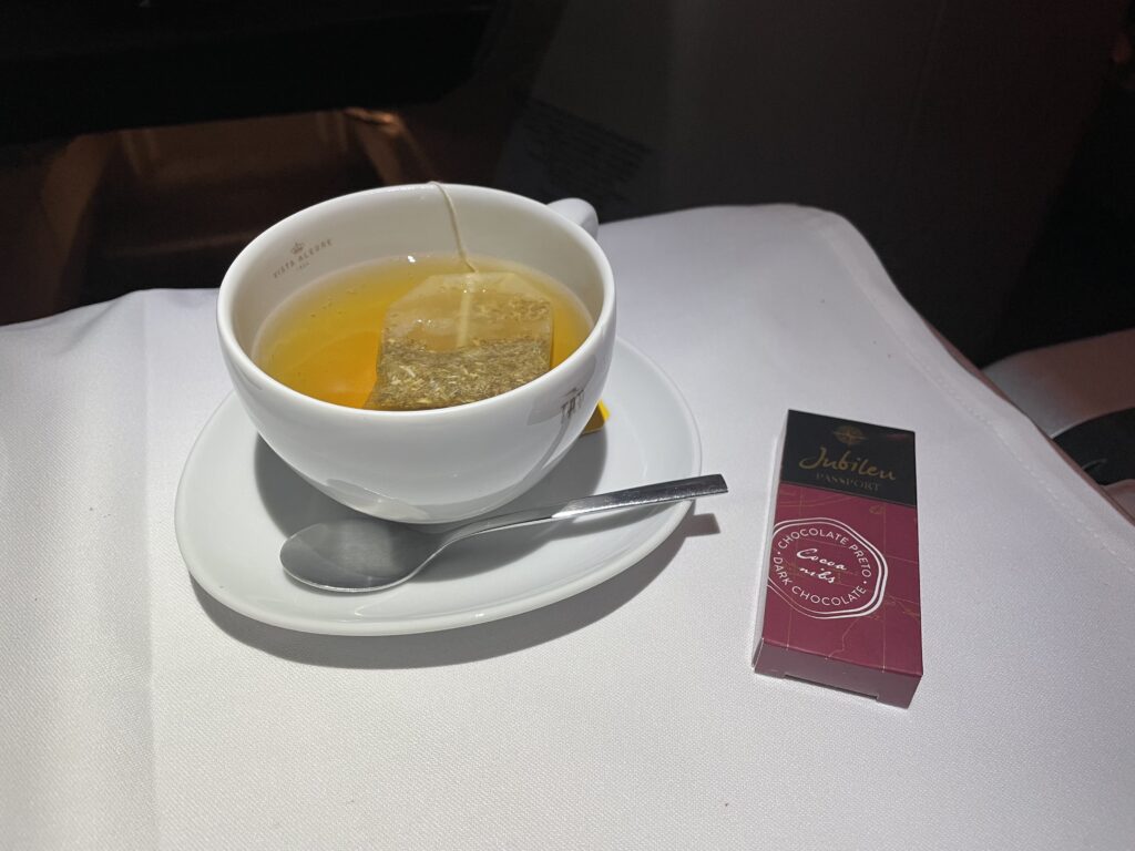 a cup of tea with a tea bag in it