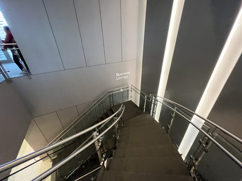a staircase with metal railings