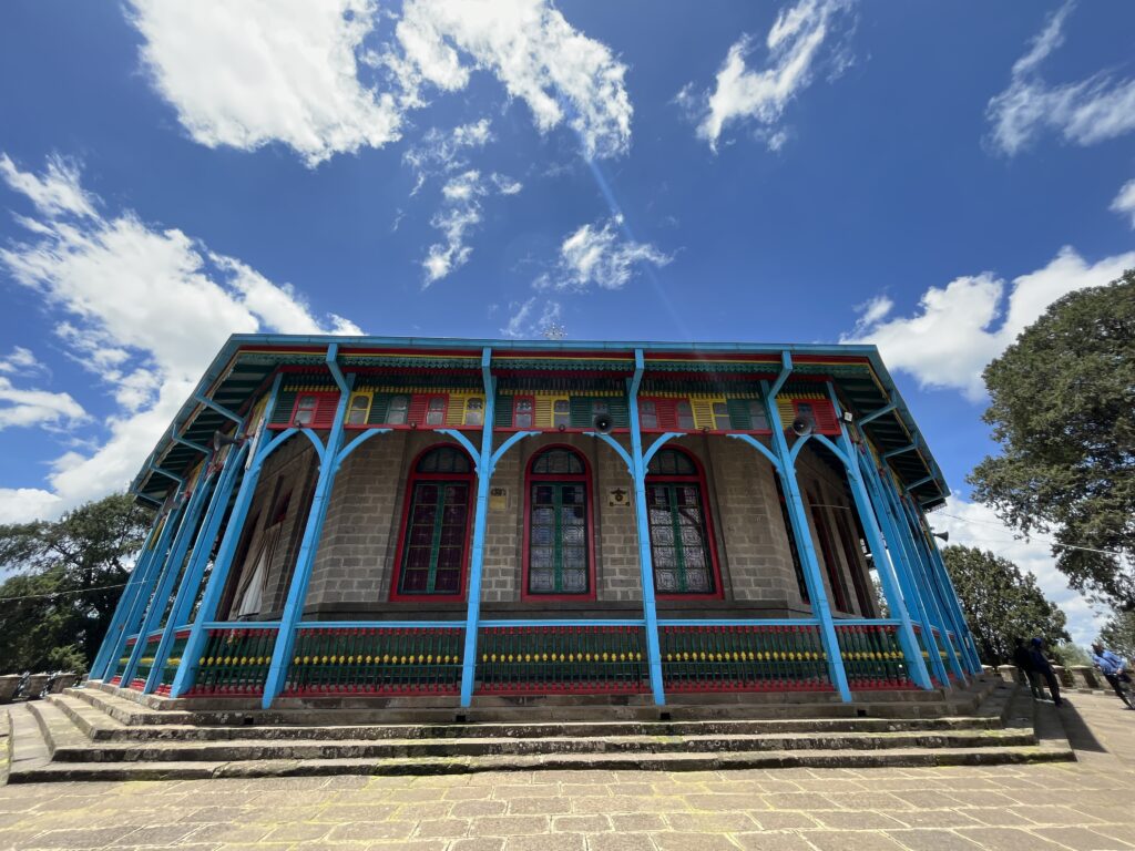 a building with blue railings