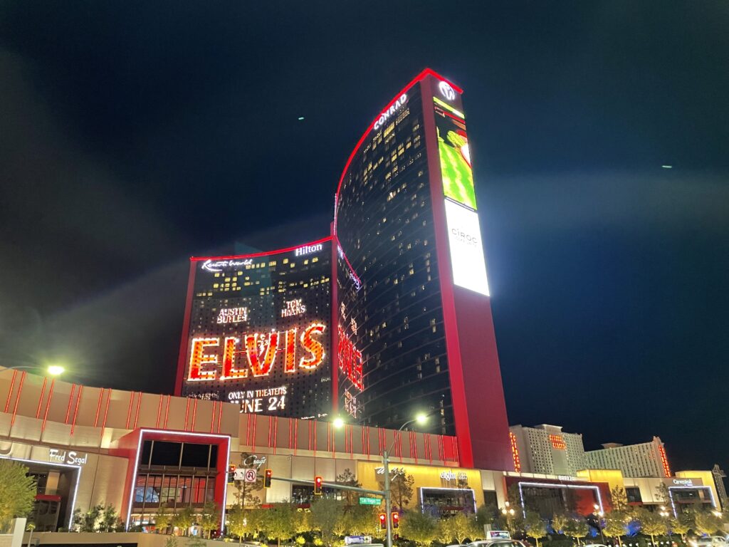 a large building with red lights