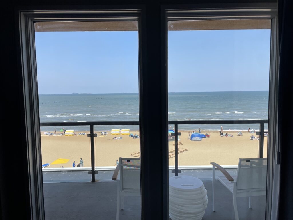 a view of the beach from a balcony